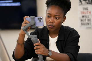 Student with camera